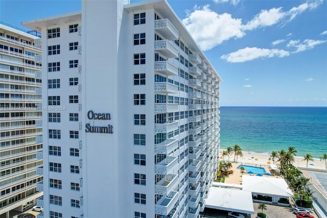 view of building exterior with a water view