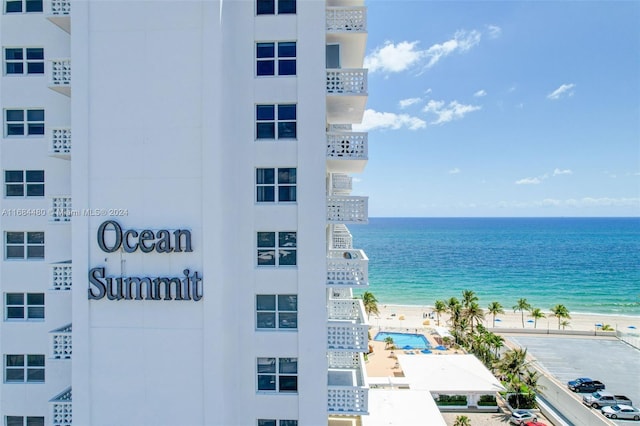 property view of water featuring a beach view