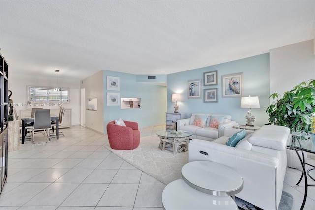 tiled living room with a textured ceiling