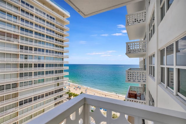 view of water feature with a beach view