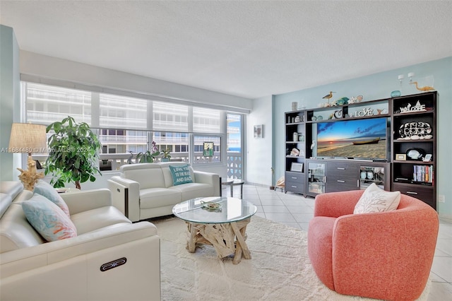 tiled living room with a textured ceiling