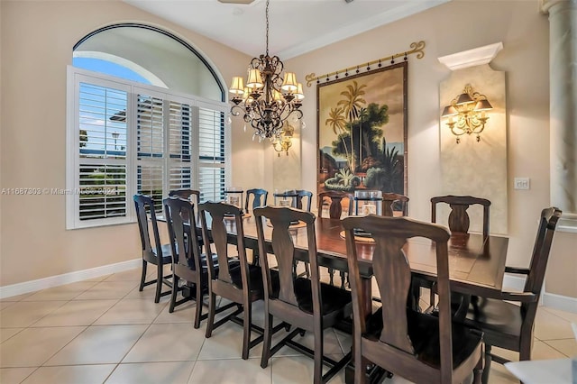 dining area with light tile patterned flooring and a chandelier