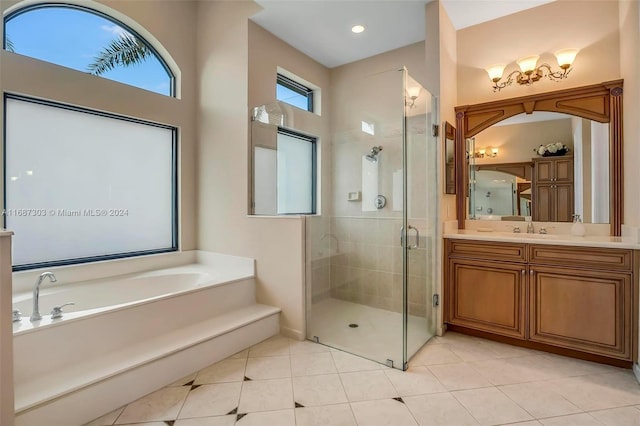 bathroom featuring separate shower and tub, tile patterned flooring, and vanity