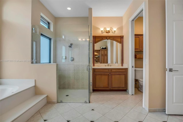 full bathroom with tile patterned flooring, vanity, toilet, and independent shower and bath