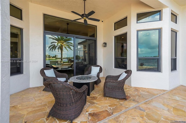 view of patio with ceiling fan