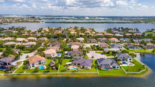 drone / aerial view featuring a water view