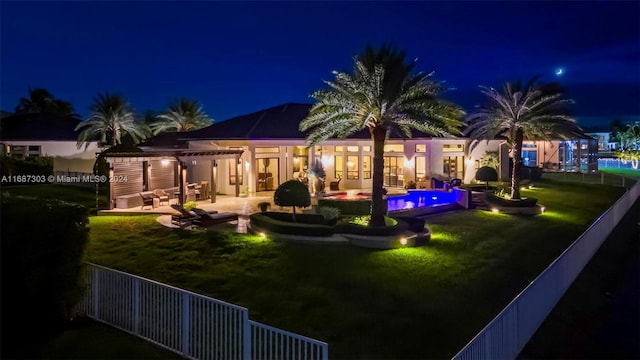 exterior space featuring an outdoor living space, a yard, and a patio