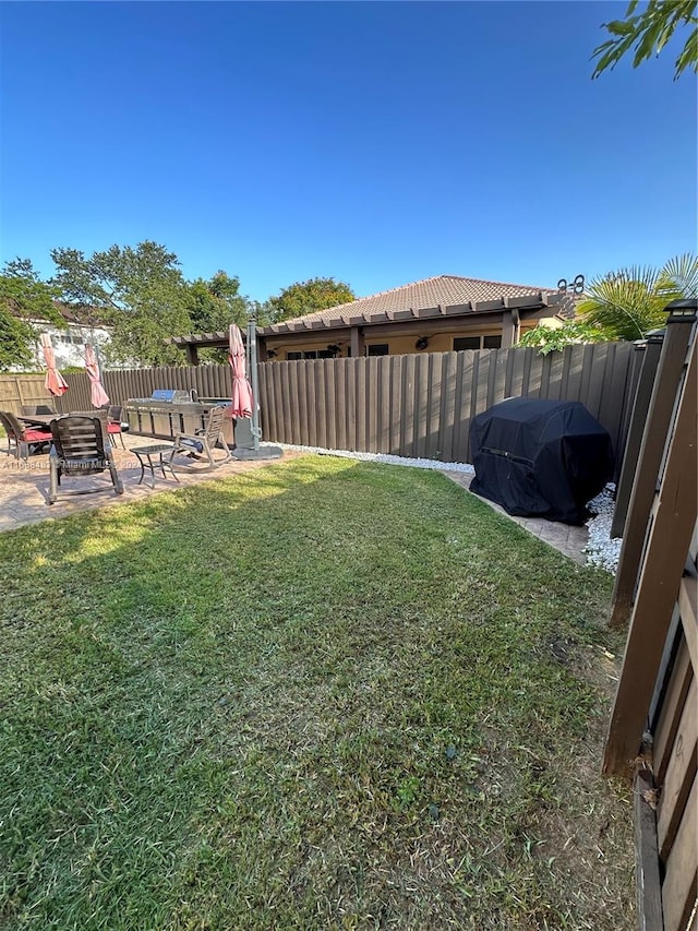 view of yard with a patio area