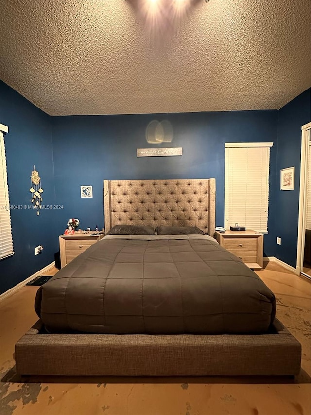 bedroom with a textured ceiling