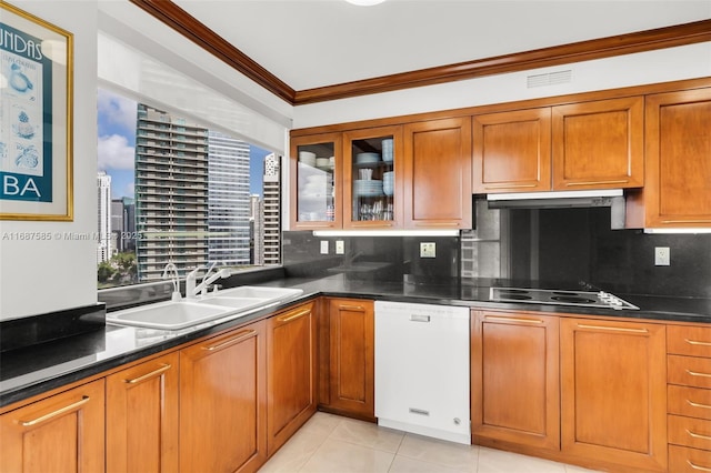 kitchen with sink, backsplash, white appliances, light tile patterned floors, and ornamental molding