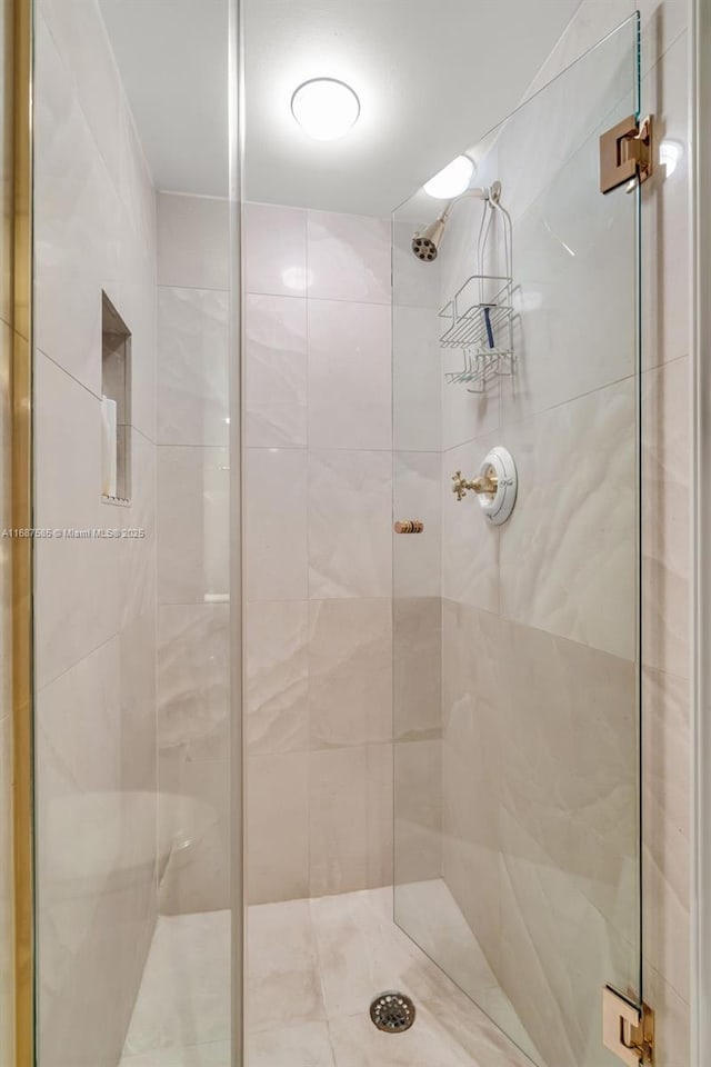 bathroom with an enclosed shower