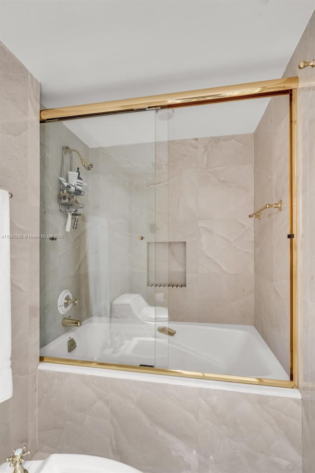 bathroom featuring enclosed tub / shower combo