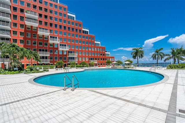 view of pool featuring a patio area