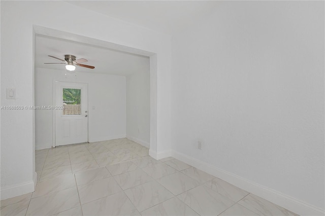 spare room featuring ceiling fan