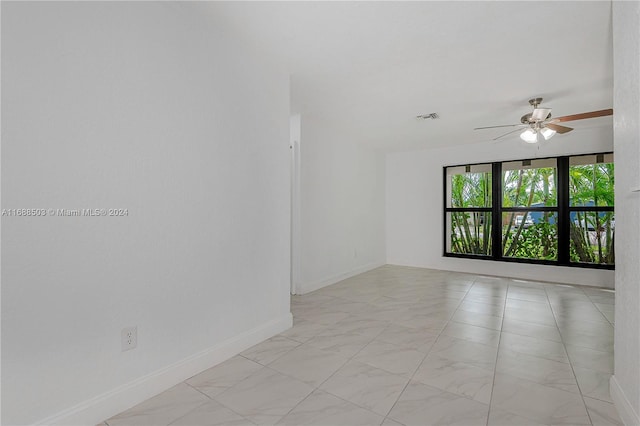 empty room with ceiling fan