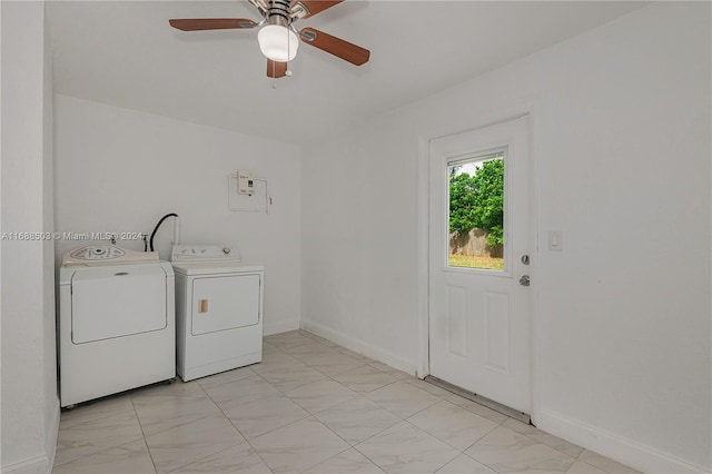 clothes washing area featuring washing machine and clothes dryer and ceiling fan