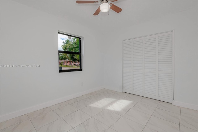 spare room featuring ceiling fan