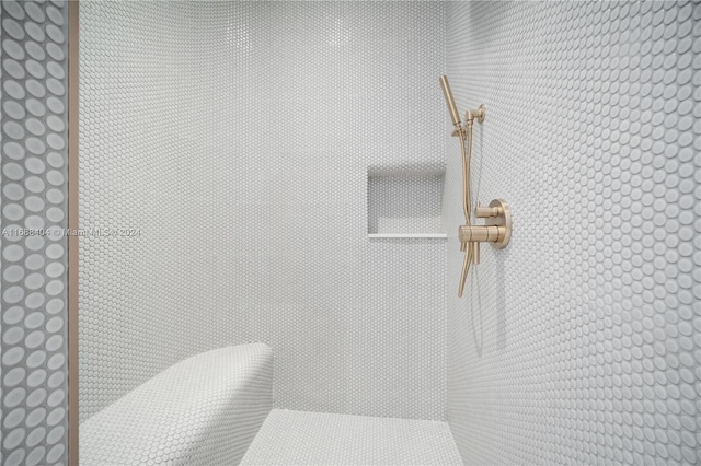 details with a tile shower