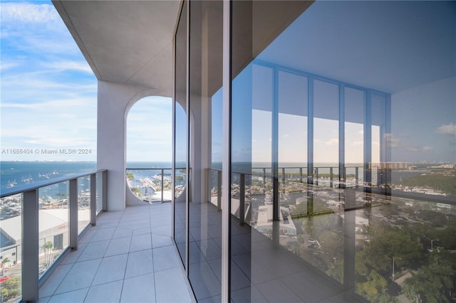 balcony featuring a water view