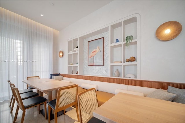 dining area with built in shelves