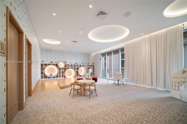 dining area featuring carpet