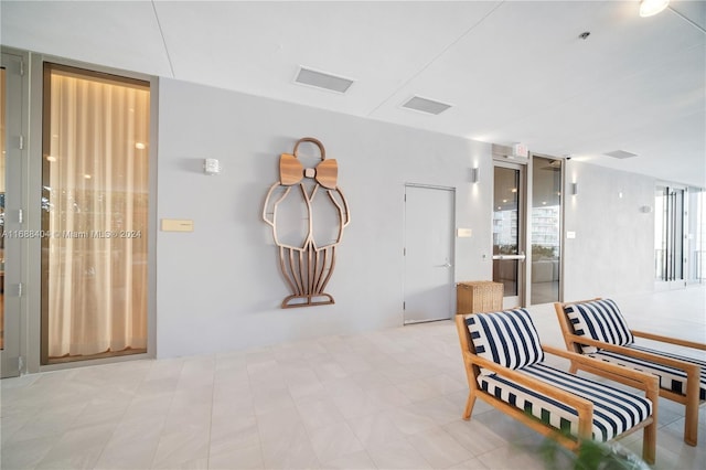 sitting room with expansive windows