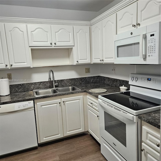 kitchen featuring white cabinetry, white appliances, sink, and dark hardwood / wood-style floors