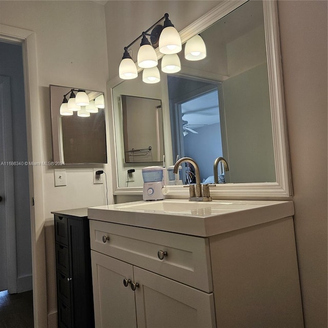 bathroom featuring vanity and crown molding