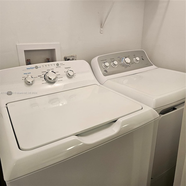 laundry area featuring separate washer and dryer