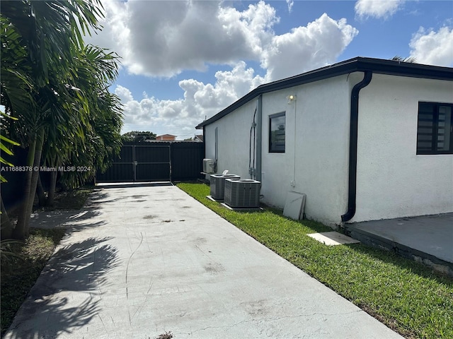 view of home's exterior featuring central AC unit