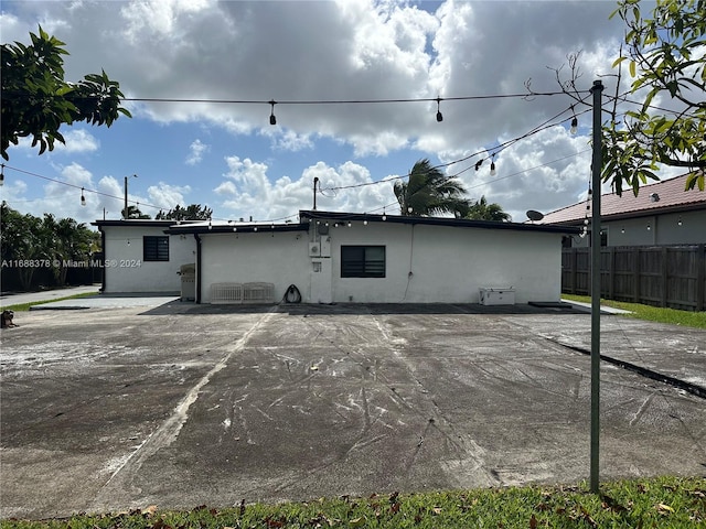 rear view of property featuring a patio