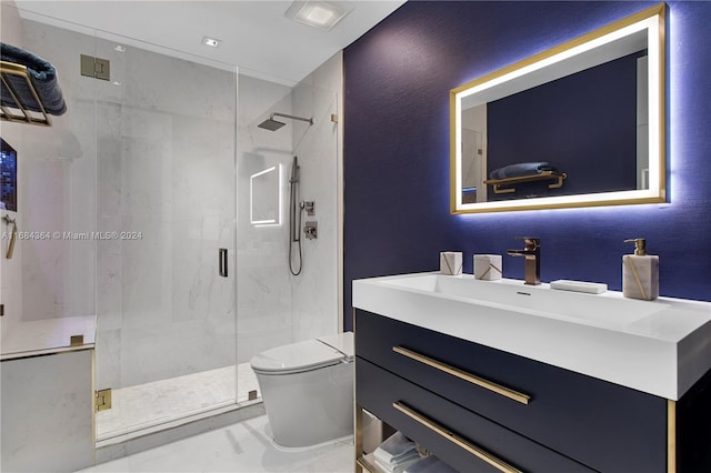 bathroom featuring walk in shower, vanity, and toilet