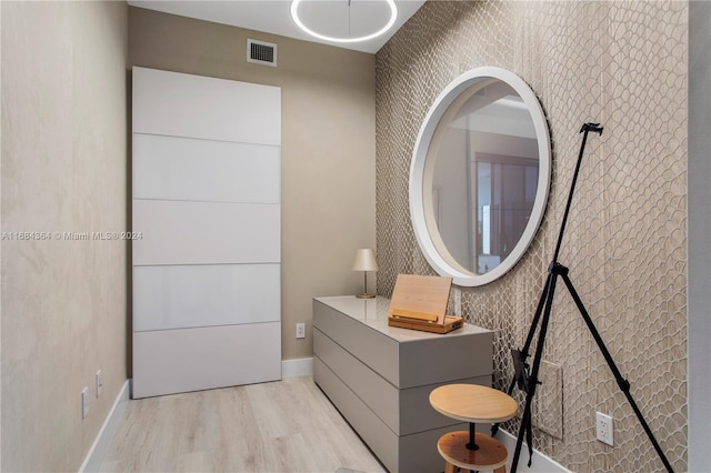 bathroom featuring wood-type flooring