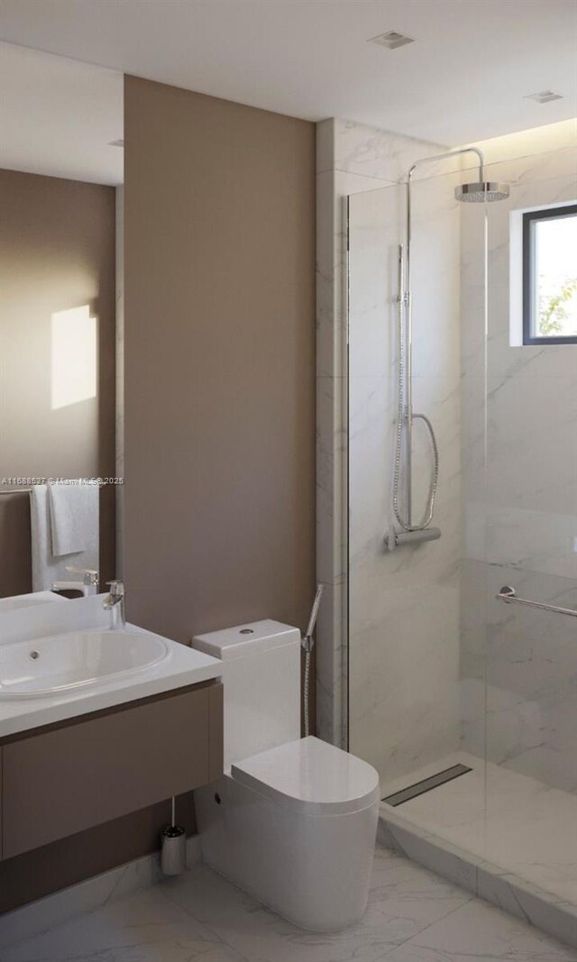 bathroom featuring a shower with door, vanity, and toilet