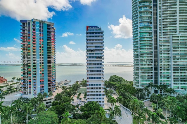 view of building exterior with a water view