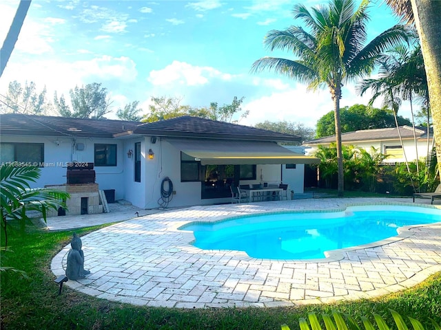 view of pool with a patio