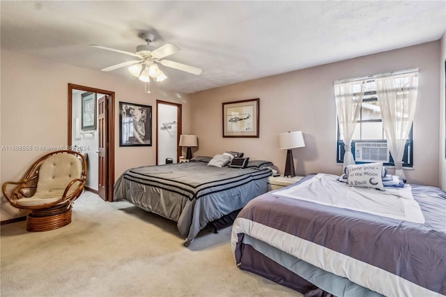 bedroom with cooling unit, light colored carpet, and ceiling fan