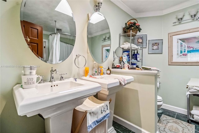 bathroom featuring toilet, walk in shower, and crown molding