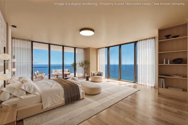 bedroom featuring expansive windows, access to outside, a water view, and hardwood / wood-style floors