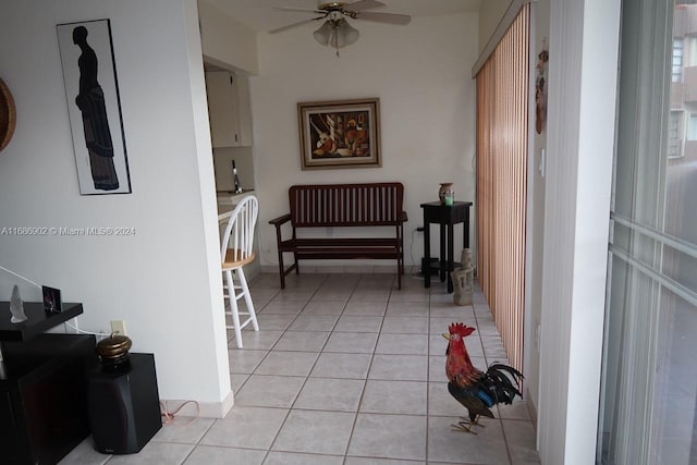 corridor featuring light tile patterned flooring