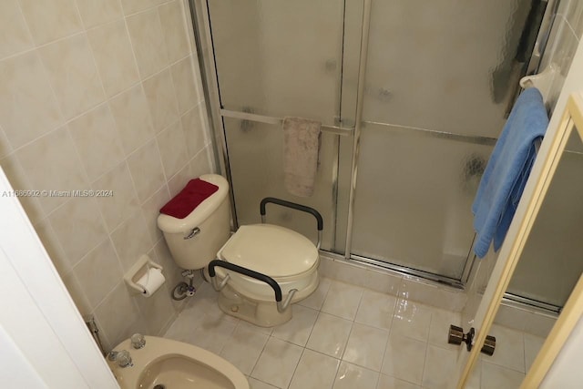 bathroom with tile walls, a bidet, walk in shower, tile patterned flooring, and toilet