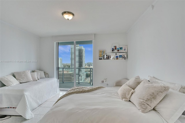 bedroom featuring light tile patterned floors and crown molding