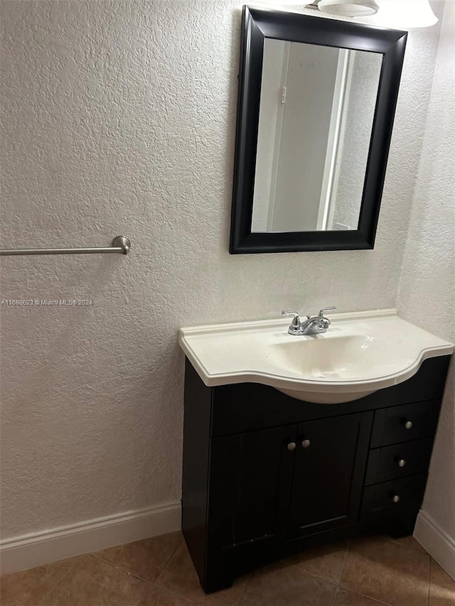 bathroom with vanity and tile patterned floors