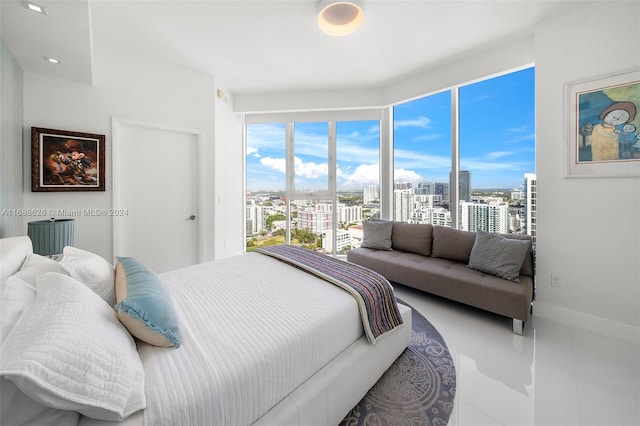 tiled bedroom featuring access to exterior