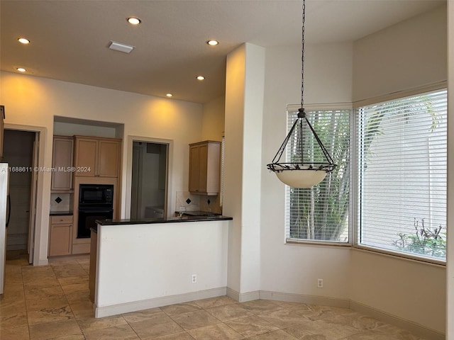 kitchen with black appliances, decorative backsplash, decorative light fixtures, and light brown cabinetry