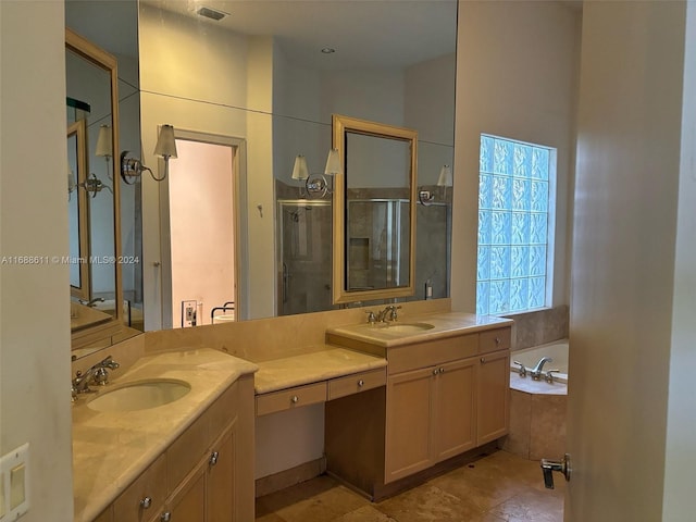 bathroom featuring vanity and separate shower and tub