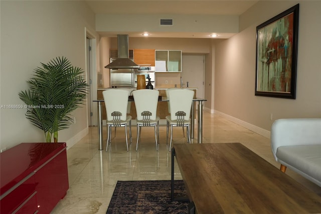 dining space featuring sink