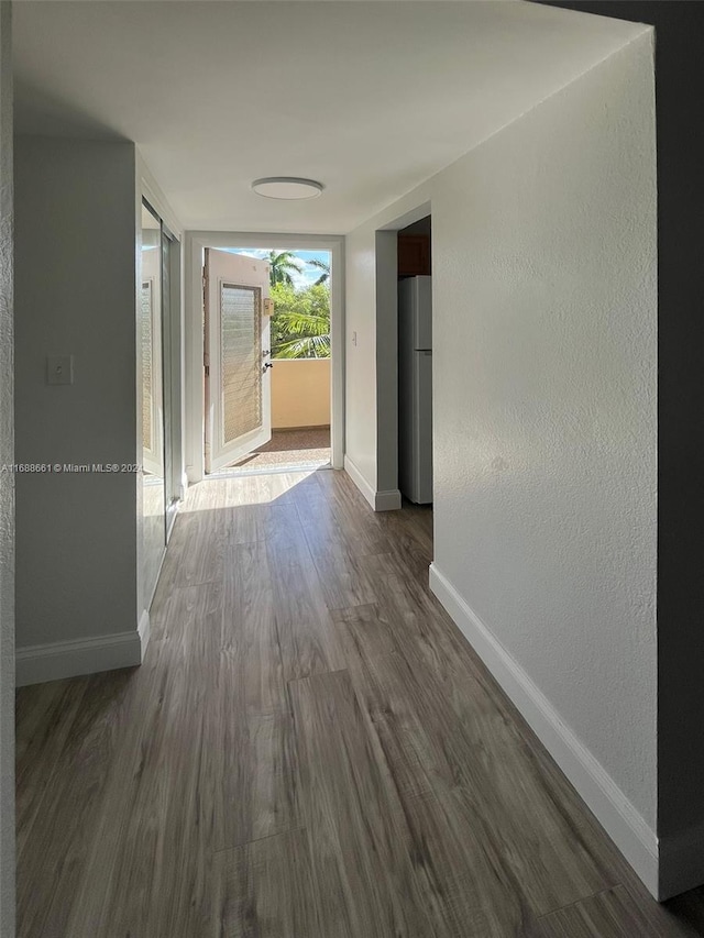 hall featuring dark hardwood / wood-style flooring