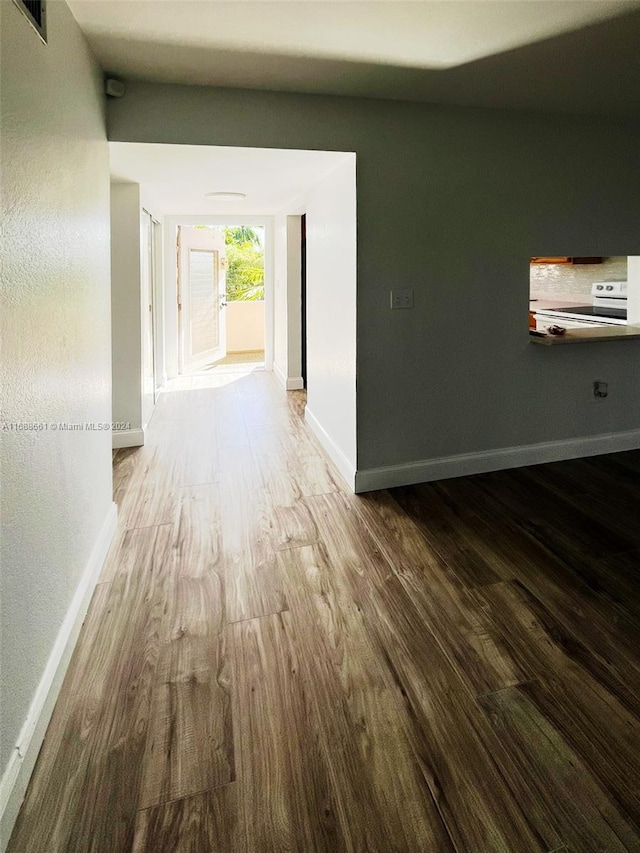 hall featuring wood-type flooring