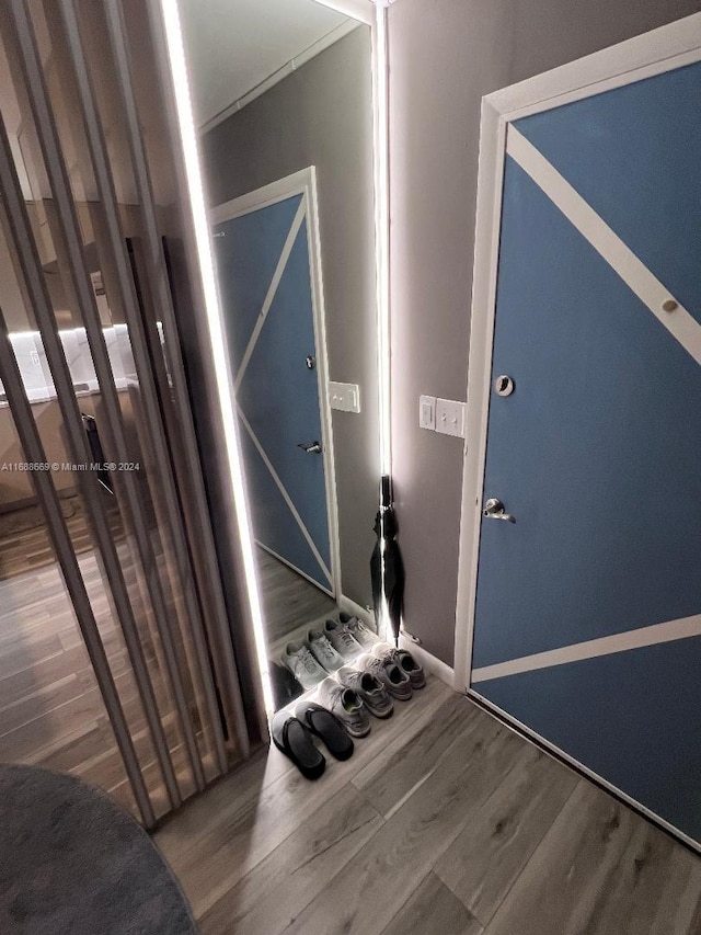 111 Golden Isles Dr Unit G5, Hallandale Beach, FL 33009 - stairway with wood finished floors and baseboards